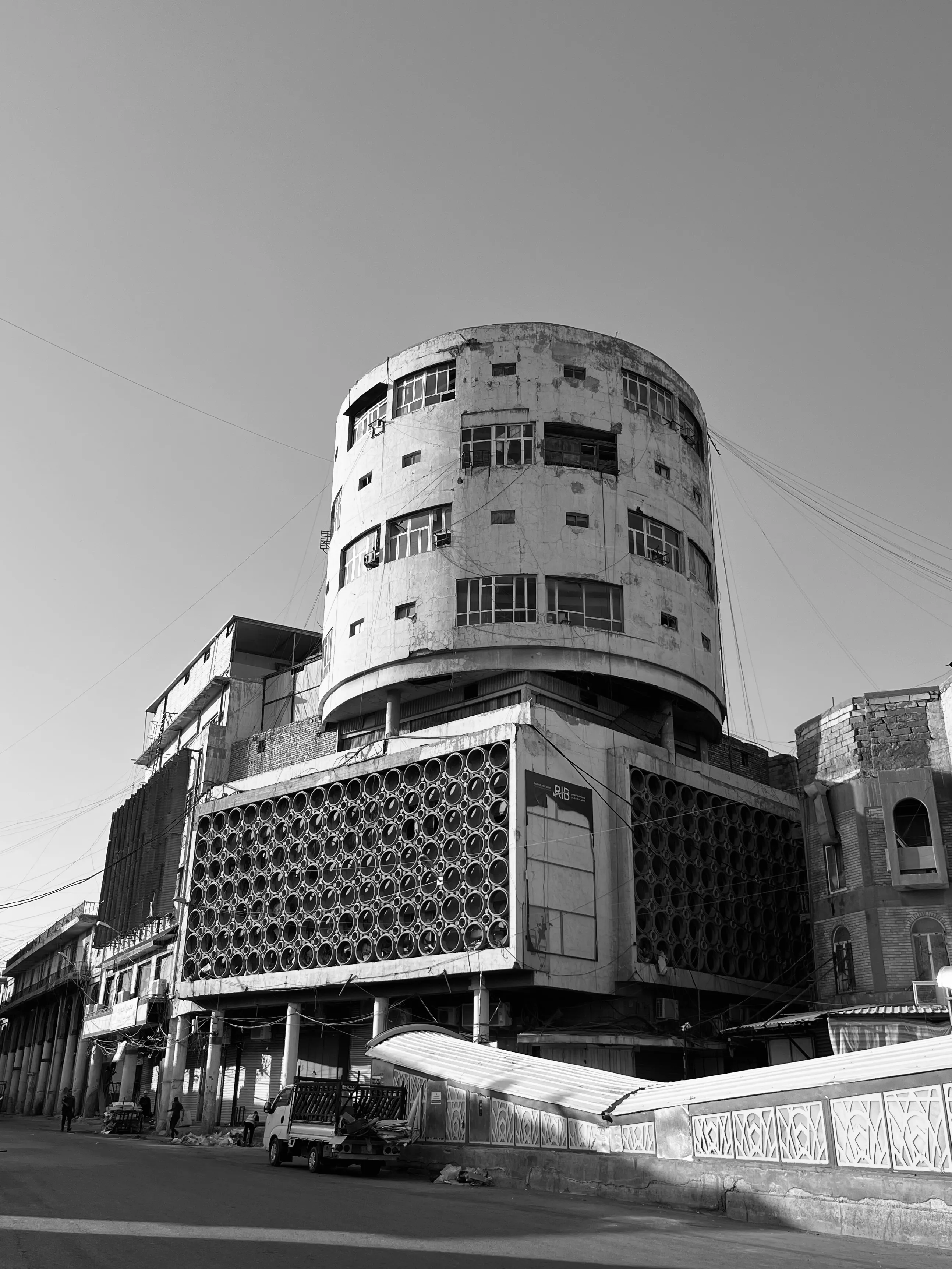 Black and white photo of the Abboud Building in Baghdad